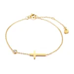 Gold cross bracelet with zircon for women